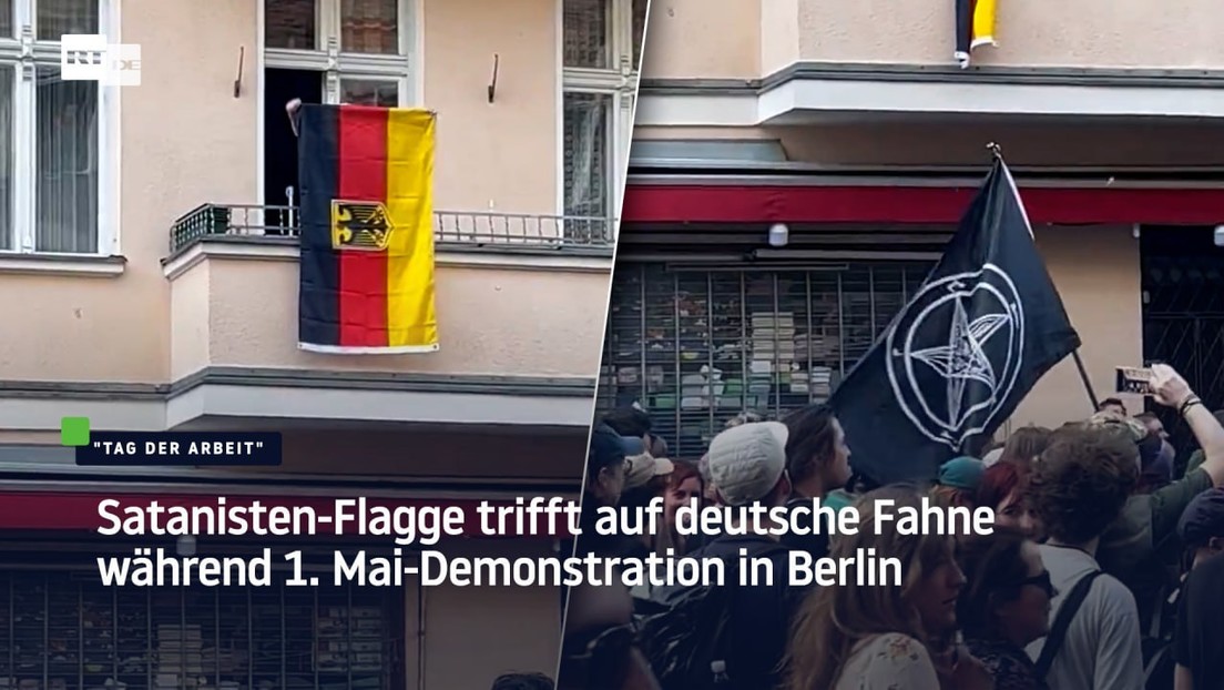 Satanisten-Flagge trifft auf deutsche Fahne während 1. Mai-Demonstration in Berlin-Neukölln