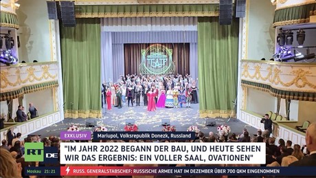 RT DE-Exklusiv: Theater von Mariupol feiert Wiedereröffnung nach Wiederaufbau