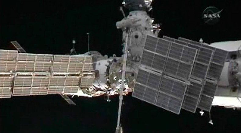 Flying space junk sees ISS crew take refuge in Soyuz craft