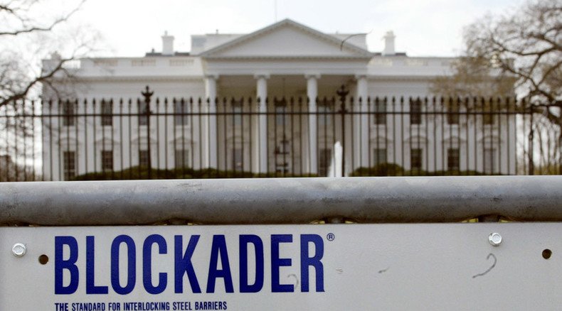 White House placed on lockdown after woman jumps barricade