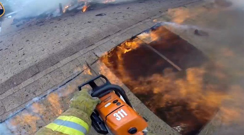 Thrilling body cam footage shows firefighters battling raging fire