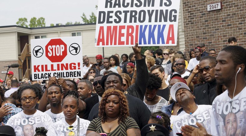 Shots fired during memorial march for Michael Brown in Ferguson