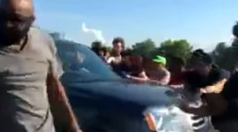 Two black women charged with blocking highway during Ferguson protests