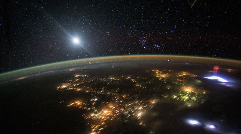 'Red Sprite’: ISS astronauts capture rare flash of light dancing atop thunderstorm (PHOTO)