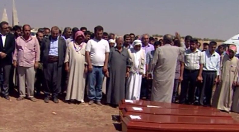 ‘I blame myself’: Father of drowned kids lays family to rest at home in Kobani (VIDEO)