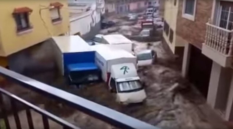 Scores of cars, trucks washed away as torrential floods hit southern Spain (VIDEO)