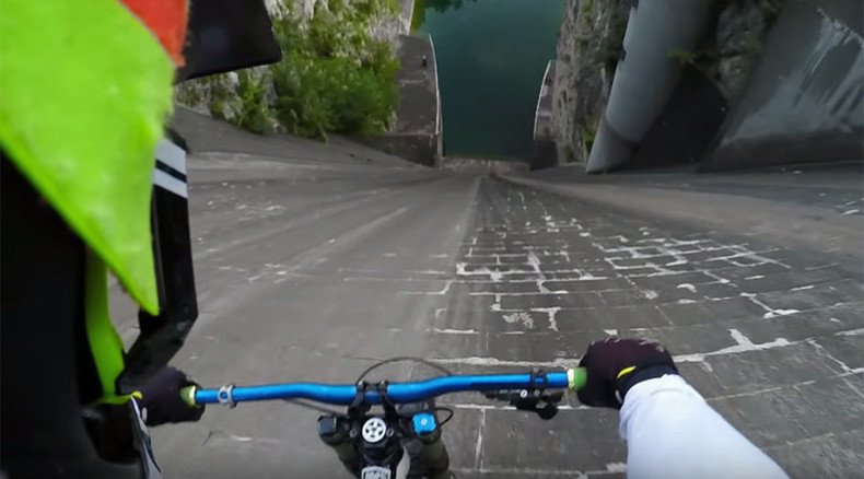 GoPro obsessed: Biker tests limits by riding off dam for prize (VIDEO)