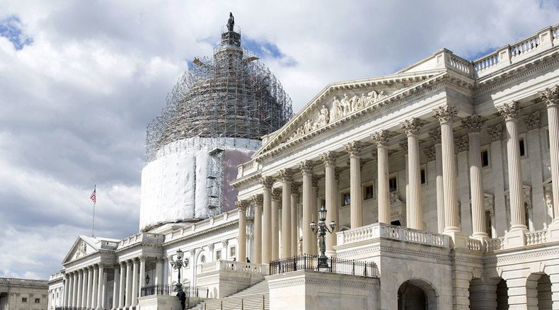Govt shutdown dodged temporarily: Obama signs spending bill