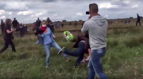 ‘My life is ruined’: Refugee-tripping Hungarian camerawoman to sue Facebook, may move to Russia 