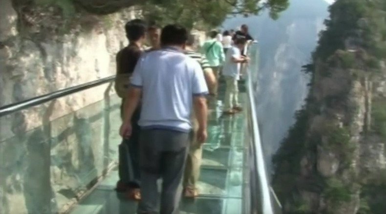 'It really cracked!' Tourists flee after glass skywalk shatters underfoot in China