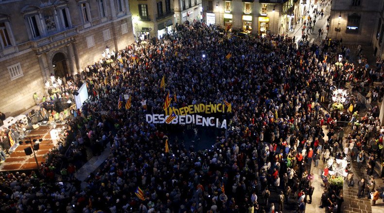 Catalonia leader in dock over rogue independence referendum, as thousands cheer outside