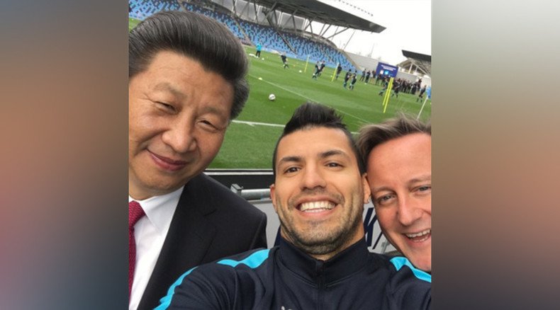 Cameron awkwardly photobombs Xi Jinping selfie with Man City footballer