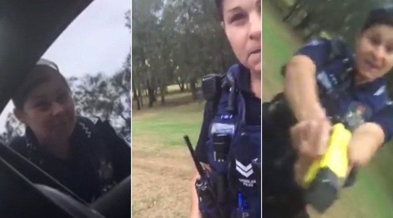 Queensland cop aims Taser stun gun at tourist with 'biker-like tattoos' (VIDEO)