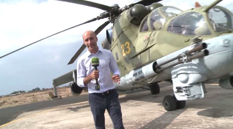 RT EXCLUSIVE: Glimpse at Mi-24 ‘flying tanks’ protecting Russian base in Syria against ISIS attacks