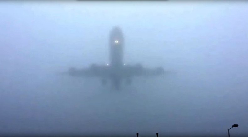The mists of Avalon? Planes flying out of thick fog at Heathrow Airport (VIDEO)