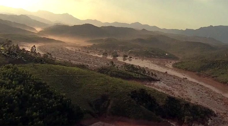 Buried under sea of mud: Aerial footage shows Brazilian town devastated in dam break (VIDEO)