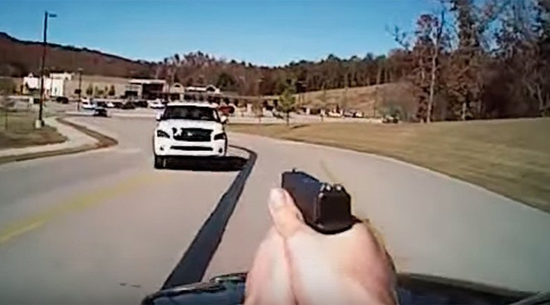 Cop shoots at woman attempting to run him down, both survive (VIDEO)
