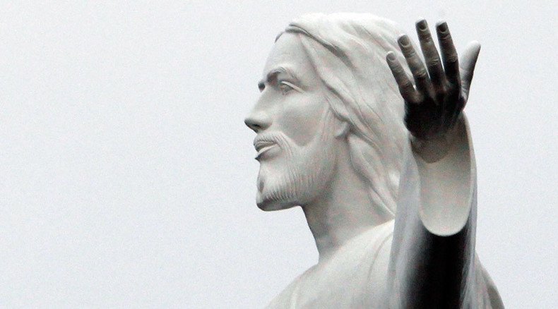 French priest smashes Jesus statue, blames job 'stress & fatigue'