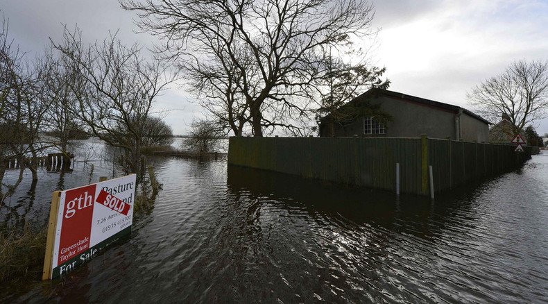 Troops deployed to build flood barriers as storms batter northern England