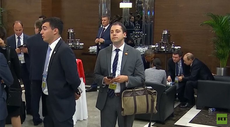 Security breach? Mystery man caught listening in on Putin-Obama talks at G20 (VIDEO)