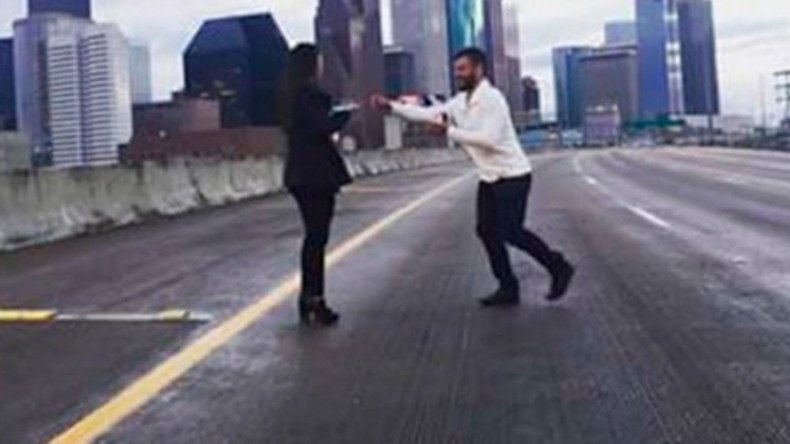 Romantic proposes on America’s busiest freeway, now faces charges