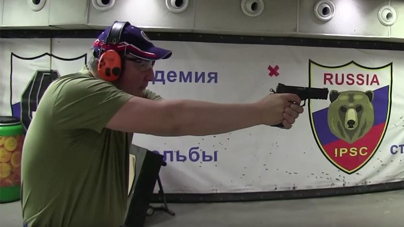 Defense industry chief Rogozin demonstrates handgun skills in YouTube video