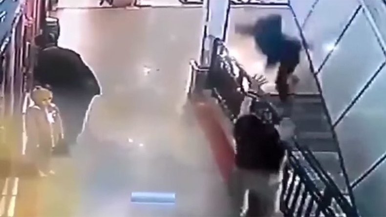 Catch of the day: Man saves falling boy (VIDEO)