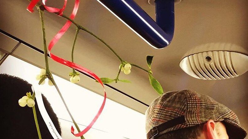 London’s blushing! Mistletoe on Tube network causes awkward commute
