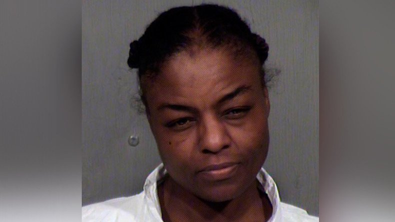 Phoenix woman keeps murder victim on couch as “shrine from God”