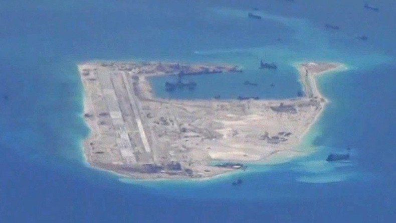 China lands 1st civilian plane on disputed islands, sparks neighbors' military fears