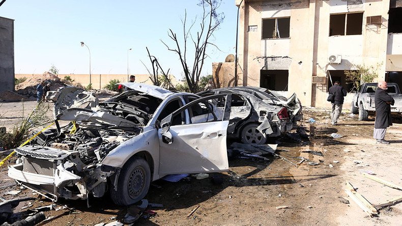 At least 65 killed in bomb attack on Libya police training center