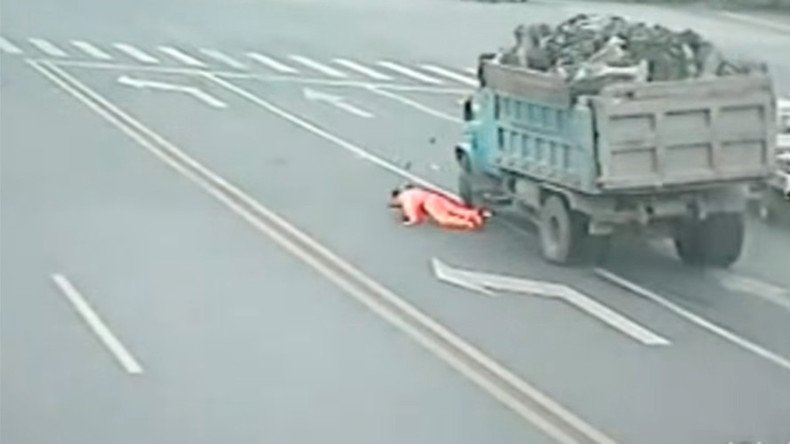 Trashed: Chinese garbage man survives head-on truck collision (VIDEO)