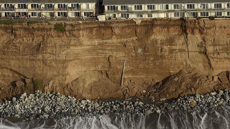 California homes on the brink, Chilean coast battered: El Nino wreaks havoc on Pacific regions