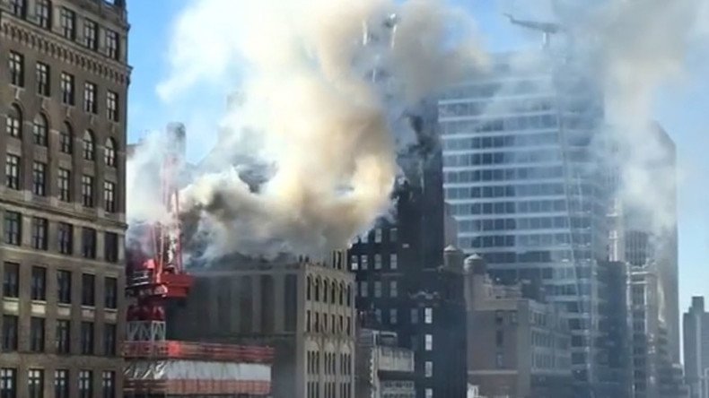Crane catches fire in Midtown Manhattan