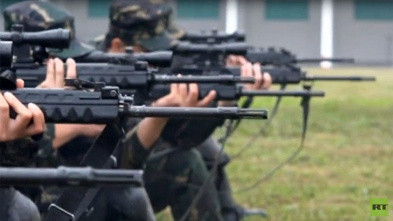 Chinese snipers show off firing skills in heavy rain (VIDEO)