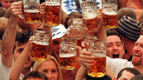 Beer buddies: Merkel sends Putin bottles of German booze, Russian leader reveals