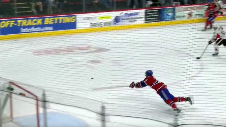 AHL hockey star makes amazing open net sliding save (VIDEO)