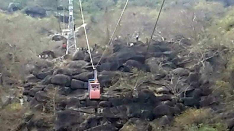 Cable car falls, injuring & trapping tourists near hilltop Indian temple