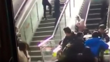 De-escalating dominoes: Human pile-up captured after mall escalator fails (VIDEO)