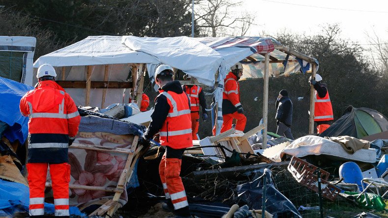 'They won't disappear': Refugees flee to safer parts of Calais 'Jungle' amid demolition