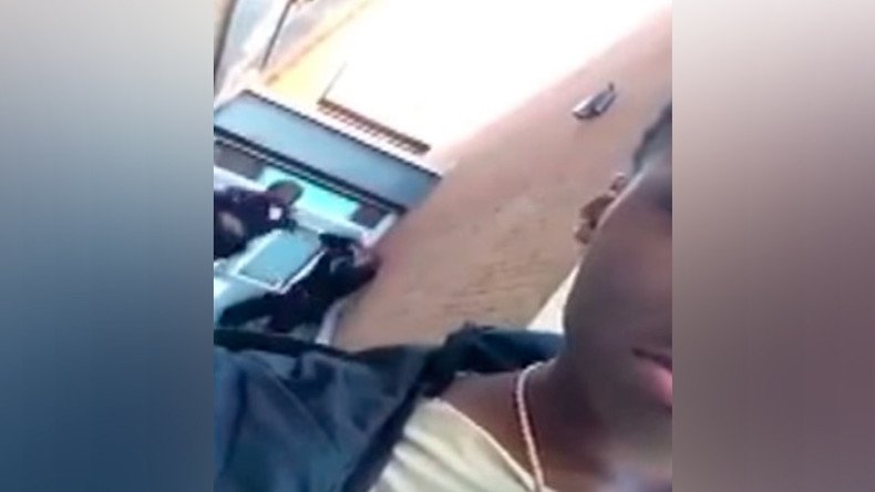 Baltimore school police chief suspended after video shows officer slapping student