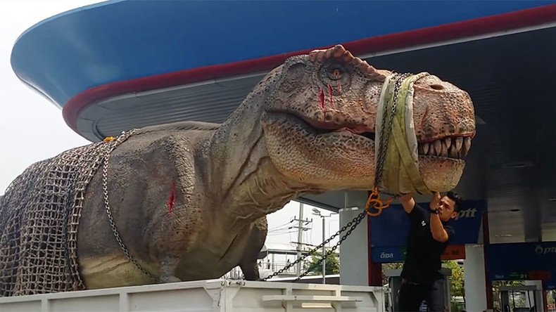 Jurassic Parked: T rex stuck in rush hour traffic (VIDEO & PHOTOS)