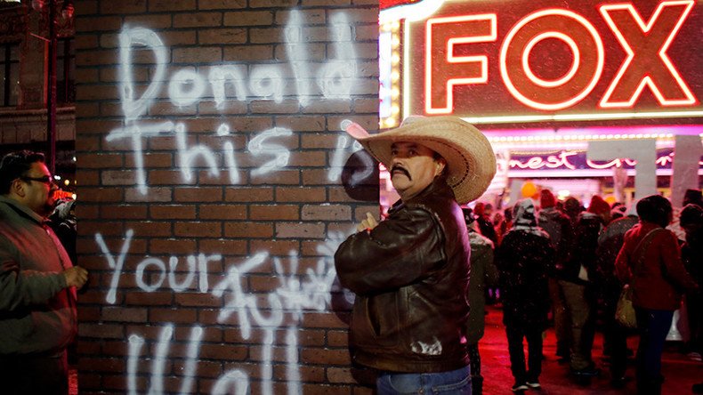 Hundreds of protesters rally outside Republican debate in Detroit