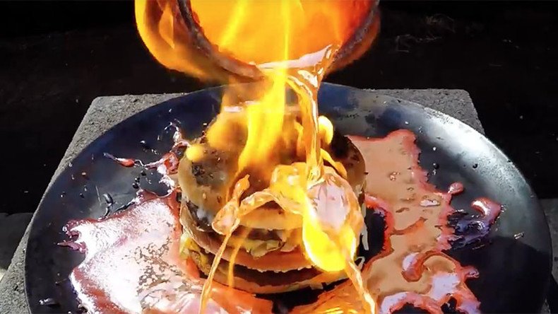 Molten copper struggles to break down Big Mac, stunning the internet (VIDEO)
