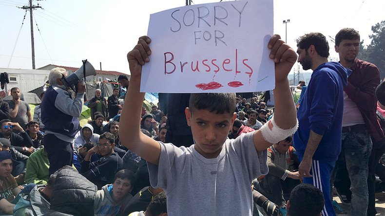 Refugee kids show support for victims of Brussels attacks (PHOTOS)