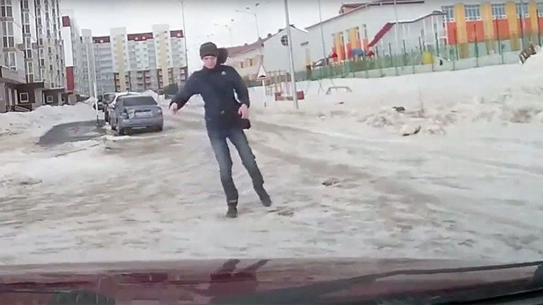 Old man takes on extreme winds… & loses (VIDEO)