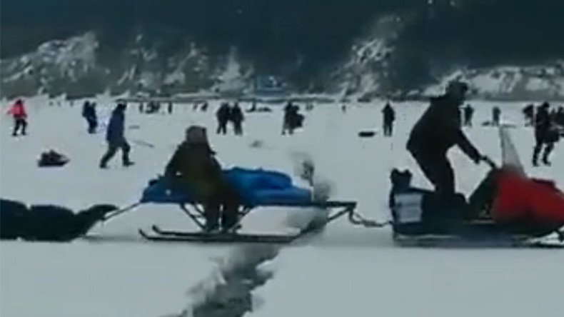 Dramatic escape for Russian fishermen as frozen lake cracks underfoot (VIDEO)
