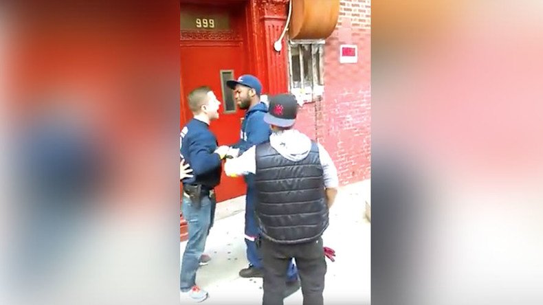 New York police lieutenant stripped of badge and gun over arrest of postal worker