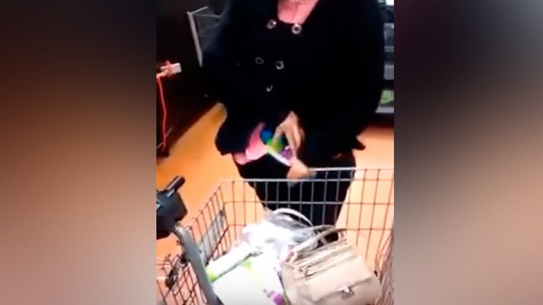 Epic shoplifter busted: Woman reveals trolley full of hidden goods (VIDEO)