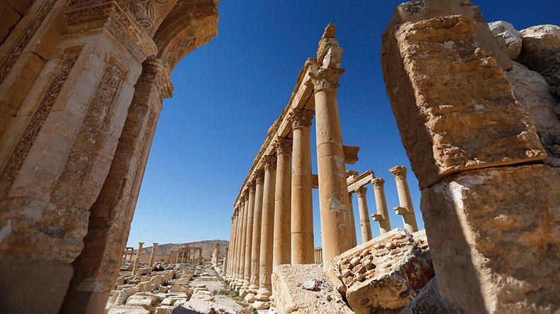 Palmyra mass grave: Tortured women & children among dozens of ISIS victims unearthed by Syrian Army